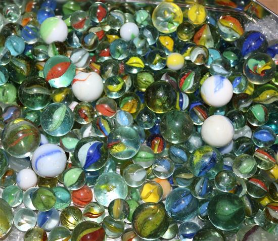 Tin of assorted marbles